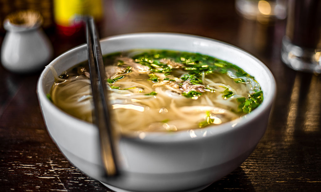 Pho Bo   Vietnamese fresh rice noodle soup with chicken, herbs a